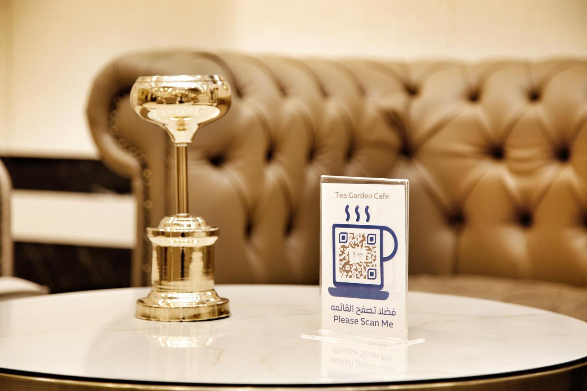 ホテル Maden Alrawda マディーナ エクステリア 写真 QR code in a coffee shop